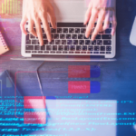 Typing on a laptop with data graphic overlays, blog article discussing CINTAP Cloud onboarding features